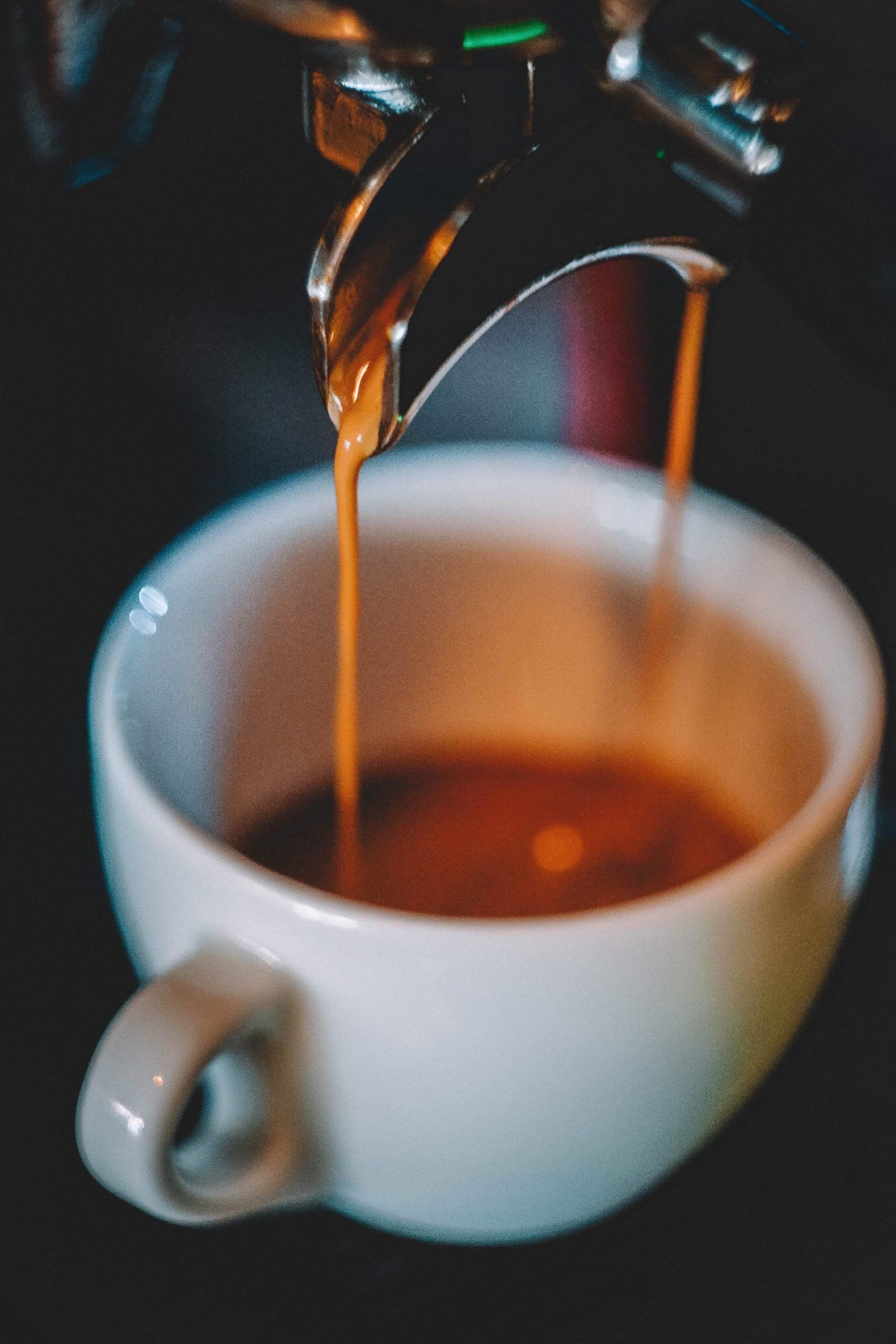 Espresso shot in white espresso cup