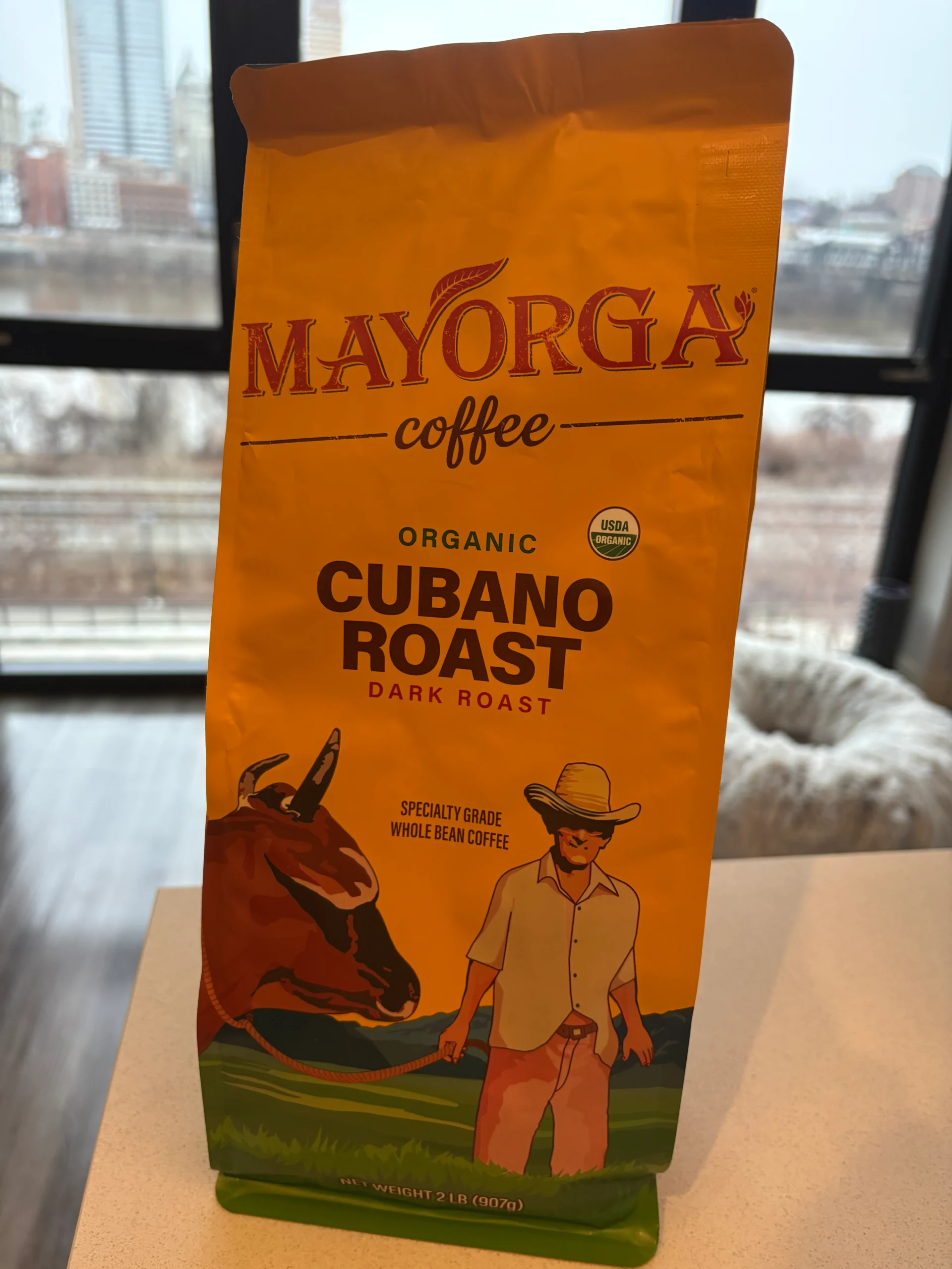 Front view of Mayorga Coffee Organic Cubano Roast Dark Roast coffee bag, showcasing its bold branding and organic label.